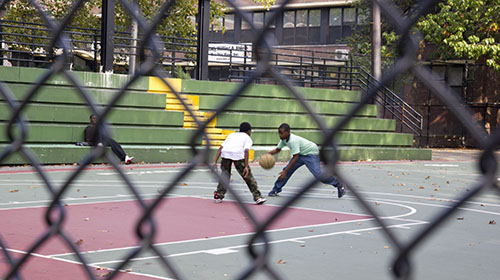 One-on-one pick up games after school are popular among neighborhood kids.(Photo by Kaitlyn Wells)